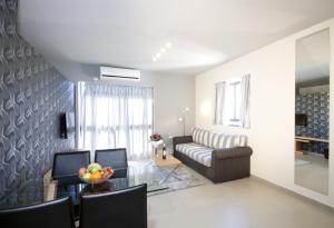 Χώρος καθιστικού στο Hillel 11 Hotel