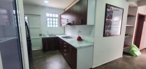 Η κουζίνα ή μικρή κουζίνα στο Hostal Guelaguetza Baño Compartido