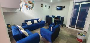 Χώρος καθιστικού στο Hostal Guelaguetza Baño Compartido