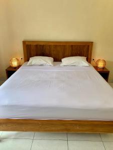 Cama o camas de una habitación en The Sampan