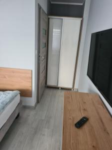 Postel nebo postele na pokoji v ubytování DOM GOŚCINNY ANNA