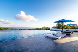The swimming pool at or close to Surya Melasti Exclusive Beach Villa by Sajiwa