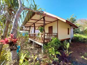 a small house in the middle of a forest at Blue Sky Bungalow in Ko Jum