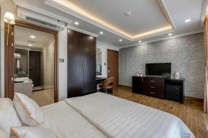 TV a/nebo společenská místnost v ubytování Hotel Trí Lê + 37 fotografií