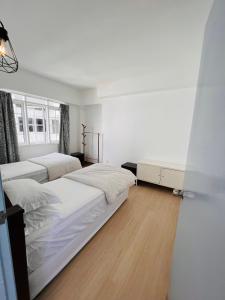 Una cama o camas en una habitación de The Antler Silverpark Fraser's Hill