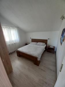 Posteľ alebo postele v izbe v ubytovaní Apartments Berti