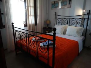 Krevet ili kreveti u jedinici u okviru objekta Apartments Karpetis a green paradise