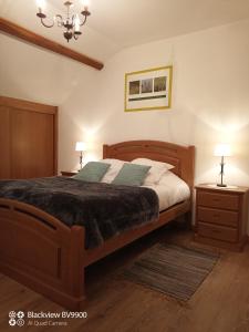 Postel nebo postele na pokoji v ubytování Le Gite des Deux Lacs Settons