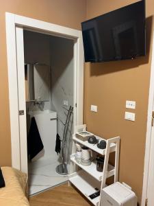 A television and/or entertainment centre at Villa Castello only room