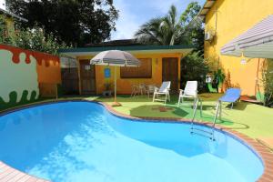 Bazén v ubytování Hotel Boutique La Casa de las Flores nebo v jeho okolí