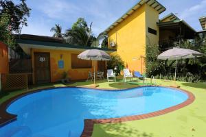 Bazén v ubytování Hotel Boutique La Casa de las Flores nebo v jeho okolí