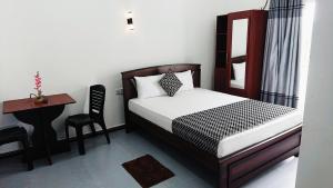 Voodi või voodid majutusasutuse Blue Diamond Resort toas