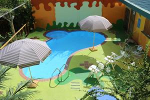 Bazén v ubytování Hotel Boutique La Casa de las Flores nebo v jeho okolí