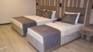 Cama ou camas em um quarto em ByAKKAN HOTEL