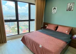 Giường trong phòng chung tại Master's Gold Coast Apartments