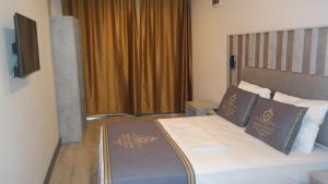 Cama ou camas em um quarto em ByAKKAN HOTEL