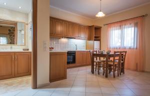 Kuchyňa alebo kuchynka v ubytovaní Kookis Village