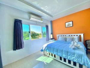 Postel nebo postele na pokoji v ubytování Ok Farm Resort