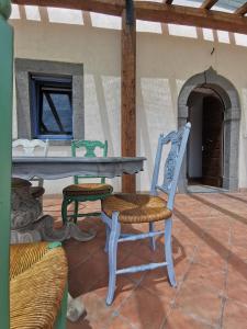 a table and two chairs on a patio at Domus Nirale in Bagnoregio