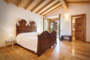Posteľ alebo postele v izbe v ubytovaní Casa del Bosco