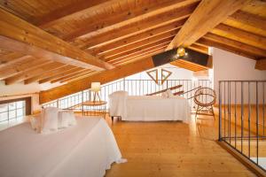 Posteľ alebo postele v izbe v ubytovaní Casa del Bosco