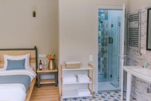 Postel nebo postele na pokoji v ubytování Hotel Chateau Iveri