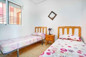 Łóżko lub łóżka w pokoju w obiekcie Espanhouse Asif 2 Bedrooms Best View Apartment