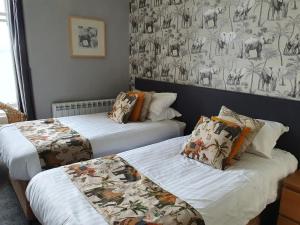 Кровать или кровати в номере The Ardyne Guest House