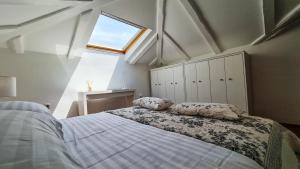 Postel nebo postele na pokoji v ubytování Design Apartment Camellia