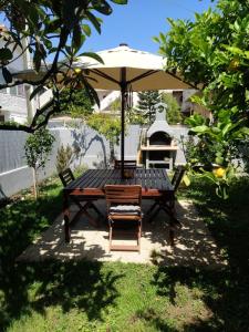 A garden outside Villa Joy - Iconic Heritage Rooms