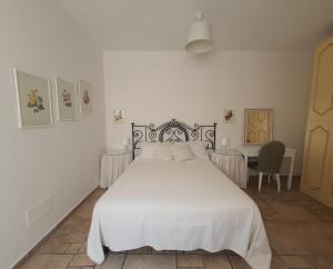 Säng eller sängar i ett rum på A casa di Carla - Villa in Salento