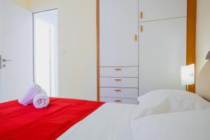 A bed or beds in a room at Pano's House