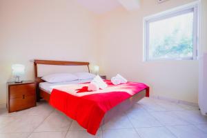 A bed or beds in a room at Pano's House