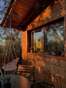 Balkoni atau teres di Mini spa in chalet bosco e trullo