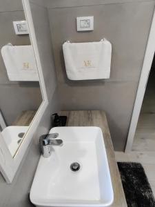 Łazienka w obiekcie Villa Korina , Pomer