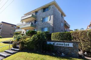 a building with a sign in front of it at Camelot Unit 12 in Forster
