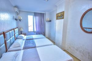 Postel nebo postele na pokoji v ubytování Hotel Chveni Sakhli