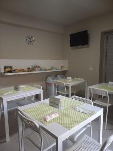 Reštaurácia alebo iné gastronomické zariadenie v ubytovaní Sonia e Alessia