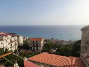 a view of the ocean from a city at Contemax in Cetraro