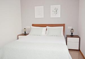 Postel nebo postele na pokoji v ubytování GALIHOST - Casa con enorme jardín en Cambados