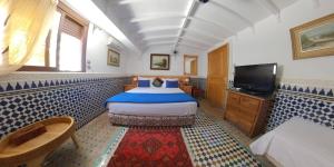 Μια τηλεόραση ή/και κέντρο ψυχαγωγίας στο Malabata Guest House