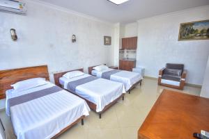 Postel nebo postele na pokoji v ubytování Hotel Chveni Sakhli