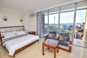 Postel nebo postele na pokoji v ubytování Hotel Chveni Sakhli