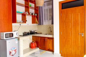 Virtuvė arba virtuvėlė apgyvendinimo įstaigoje Sea Esta suites