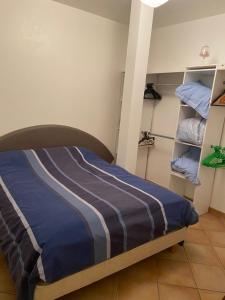 A bed or beds in a room at Appartement Rez de chaussée T2 centre-ville