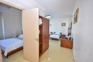 Postel nebo postele na pokoji v ubytování Hotel Chveni Sakhli