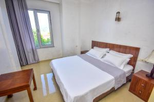 Postel nebo postele na pokoji v ubytování Hotel Chveni Sakhli