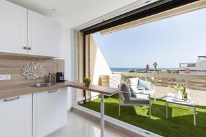 Balkon lub taras w obiekcie Blue Coral Heliopolis Naturiste