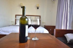 Postel nebo postele na pokoji v ubytování Hotel Chveni Sakhli
