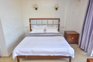 Postel nebo postele na pokoji v ubytování Hotel Chveni Sakhli